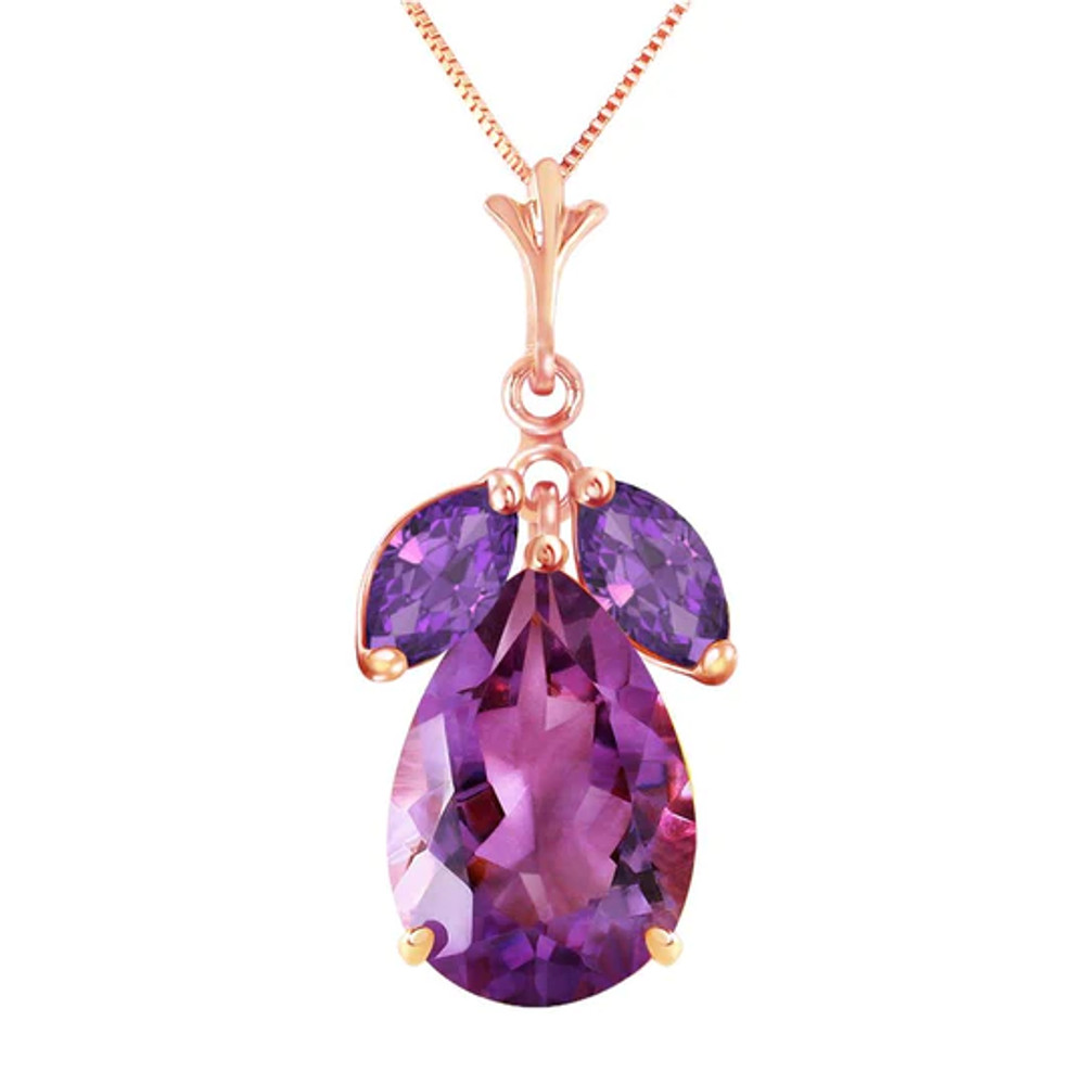 This 14k rose gold necklace with natural amethysts is pretty enough for any queen in your life. The royal color of purple is showcased brilliantly on this piece, which features three stones to throw off lots of color and light. One pear cut amethyst glows with six full carats of amazing beauty.

Two additional marquis shaped stones do an excellent job of enhancing the stone while adding another one half carat of pure bliss. The box chain included hangs at 18 inches long and is available in your choice of solid 14k yellow, white, or rose gold.