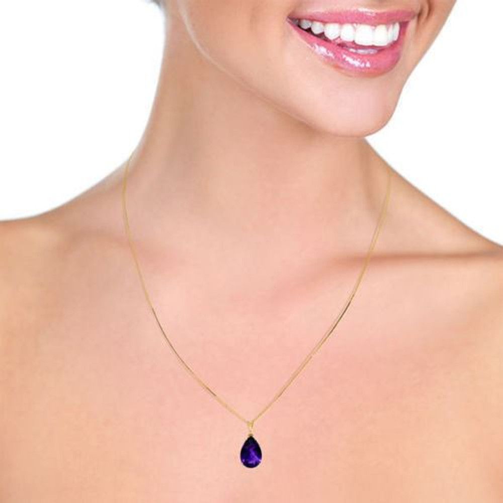 A classic solitaire necklace makes the perfect gift for a woman with classic style. The beautiful vivid birthstone of February is the focus of this 14k solid gold necklace with natural amethyst, which features one elegant pear cut stone hanging from an 18 inch box chain made of high quality yellow, white, or rose gold.

The cut and color of this stone are superb, showing off the beautiful color and facets of the stone, which weighs an amazing five carats for lots of sparkle. This look is a classic that will go with all of the trendiest clothing, as well as traditional styles.