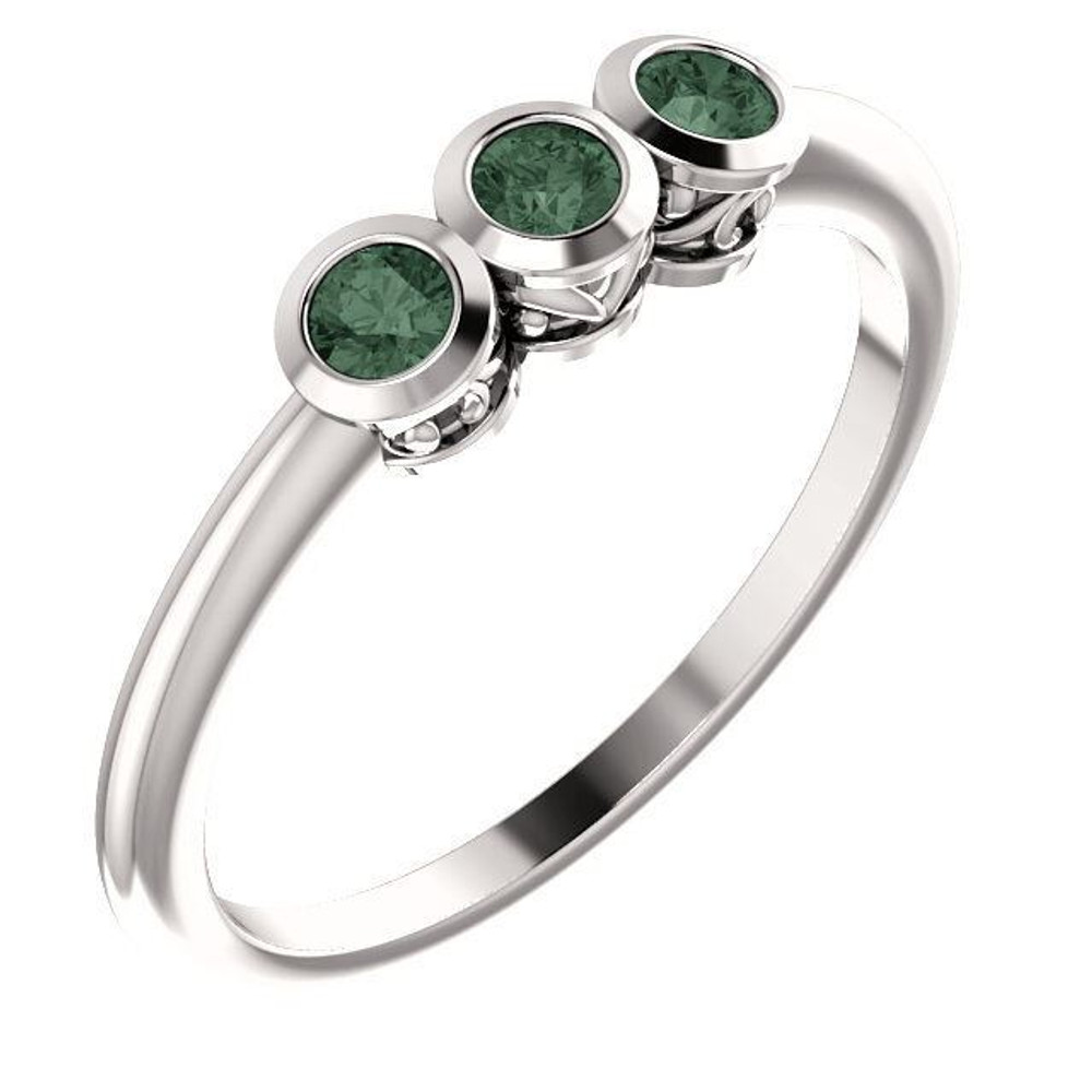 Crafted in sterling silver, this ring features 3, round, alexandrite gemstones. 