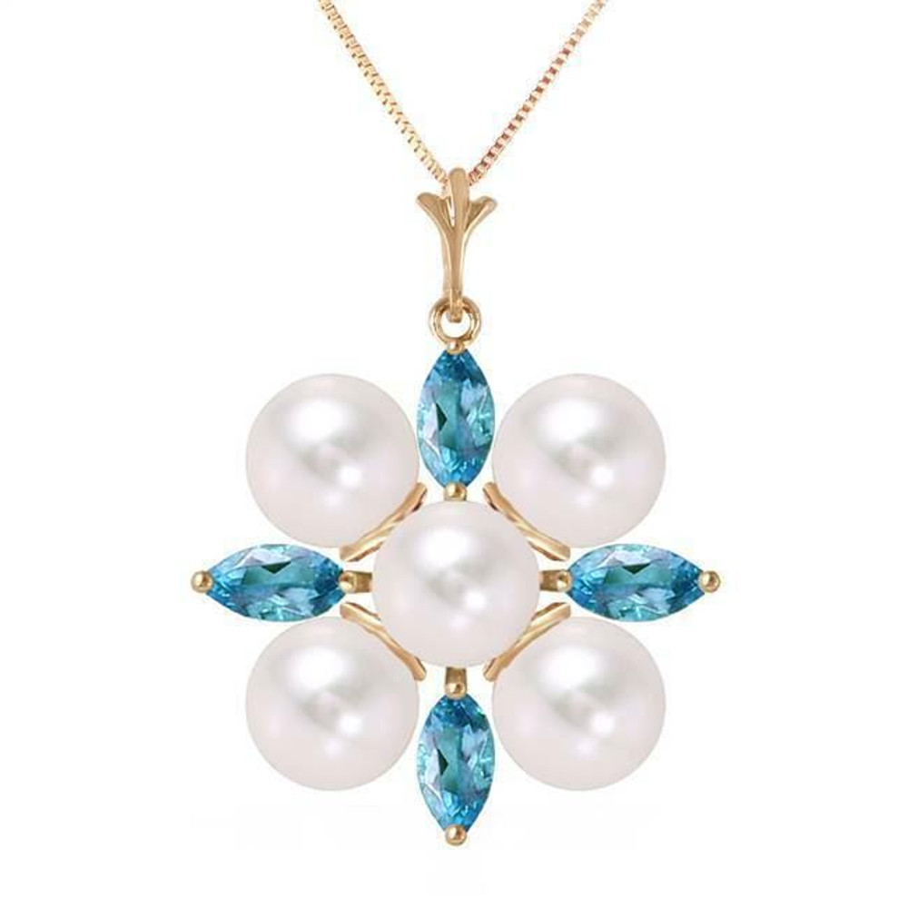  You will look cool and crisp as a winter morning when you wear this 14K. yellow gold necklace with blue topazes and pearls. A grouping of five glimmering pearls is surrounded by four marquise cut topazes that glitter when the well-crafted facets catch the light. The round pearls measure at 5.00 carat weight and the topazes are 1.30 carats in weight.
 
The pendant measures a little over an inch in height. If you are not buying a necklace for yourself today, consider this beautiful piece for a friend or family member born in June or December.