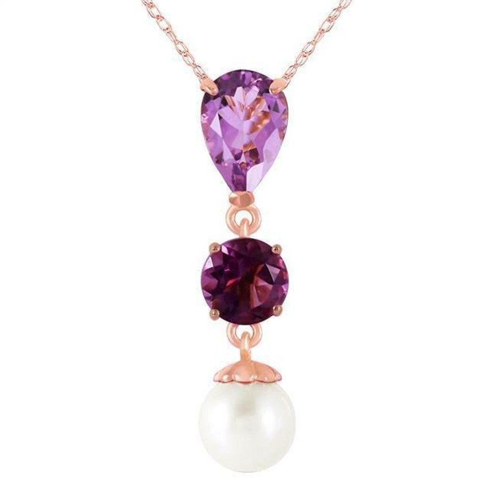  Necklaces are a fun way to dress up any outfit, and with the beauty of gold, amethyst, and natural pearls, this piece can enhance any look. On this 14k solid gold necklace with purple amethyst and pearl, the bright color of amethyst is only made brighter with the pure white of the dangling 2.5 carat pearl. 2.75 carats of stunning purple amethyst are suspended from an 18 inch long rope chain, allowing it to fall naturally when it is worn. This piece is an elegant piece that can accessorize any ensemble beautifully.