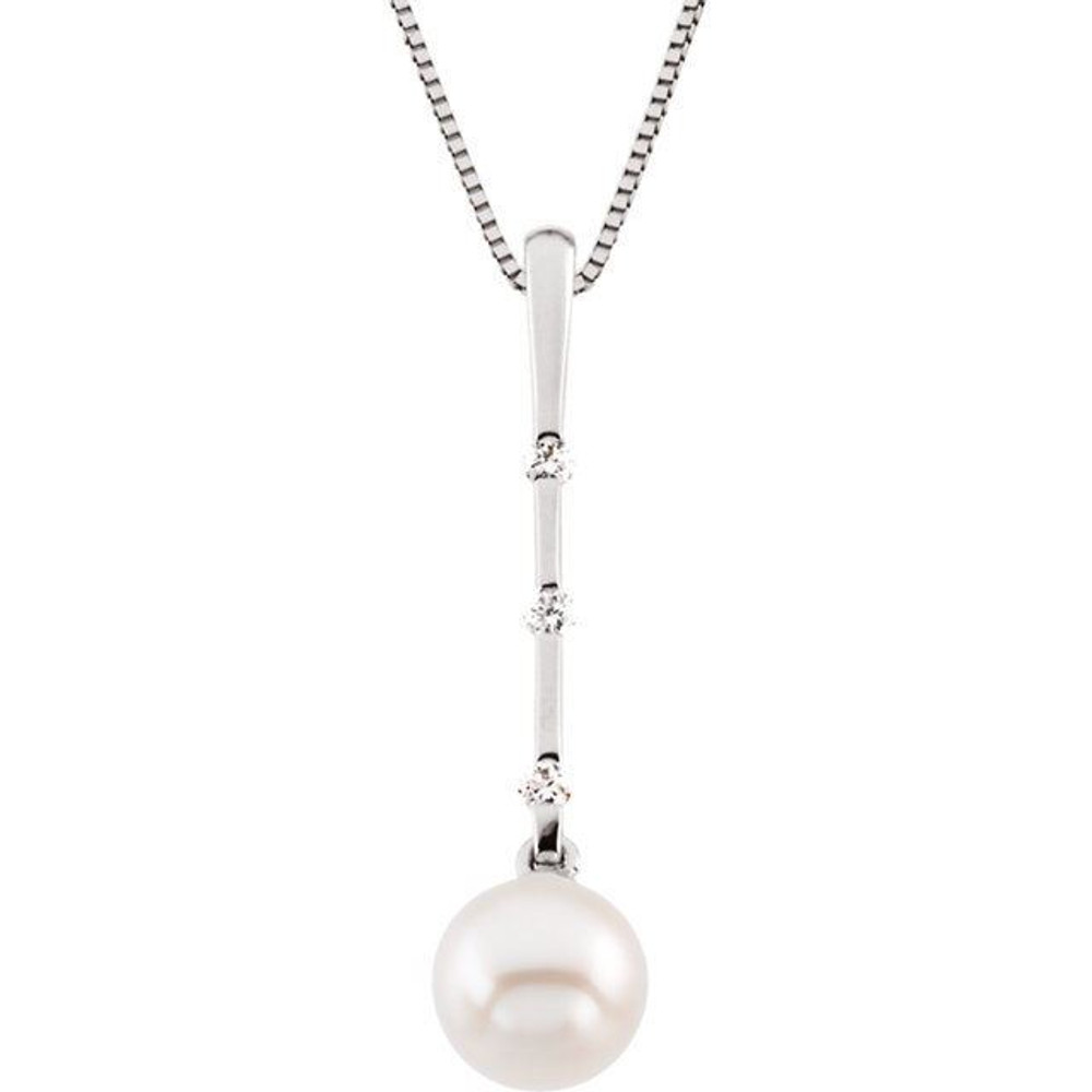 A beautiful complement, this pearl and precious diamond pendant features three diamond stones with a freshwater cultured pearl. Forged of 14k white gold, this pendant is finished off spring ring clasp.