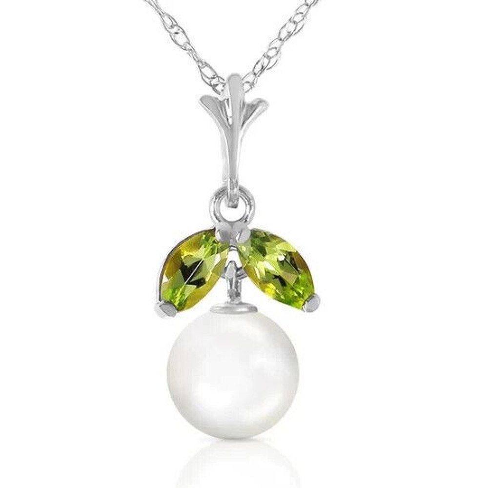 Nature and fantasy come together in this demure 14k white gold necklace with natural pearl & peridot. This truly unique piece seems straight from the fairy gardens of our wildest dreams. It features a two carat round Pearl and detail jewels of two marquis shaped .20 carat Peridot gemstones.

The Pearl hangs almost as a fantastical gemstone fruit, and the peridots seem almost to be dewy leaves. It comes with a 14k white gold 18 inch long double link rope chain. This necklace is for the dainty among us, and for those who appreciate things of sheer fantasy and perky elegance.