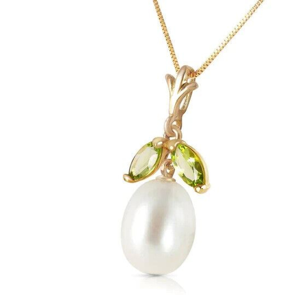 The only problem the 14k yellow gold necklace with natural pearl and peridot presents is whether to wear the peridot as a spring green or a winter holiday color -- and the answer is to wear it for both. The central pearl shines out from beneath the two marquis-cut peridots with its natural luminescence. Pearl goes with everything, and the olive green of the peridot is surprising neutral, too.

With its semiprecious gemstones, the 14k yellow gold necklace with natural pearl and peridot is dressy enough to wear for special occasions, but its gorgeous coloring will tempt you into also clasping it on for everyday use. 