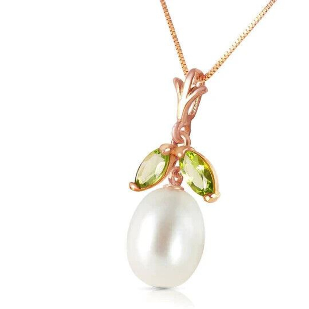 The only problem the 14k rose gold necklace with natural pearl and peridot presents is whether to wear the peridot as a spring green or a winter holiday color -- and the answer is to wear it for both. The central pearl shines out from beneath the two marquis-cut peridots with its natural luminescence. Pearl goes with everything, and the olive green of the peridot is surprising neutral, too.

With its semiprecious gemstones, the 14k rose gold necklace with natural pearl and peridot is dressy enough to wear for special occasions, but its gorgeous coloring will tempt you into also clasping it on for everyday use. 