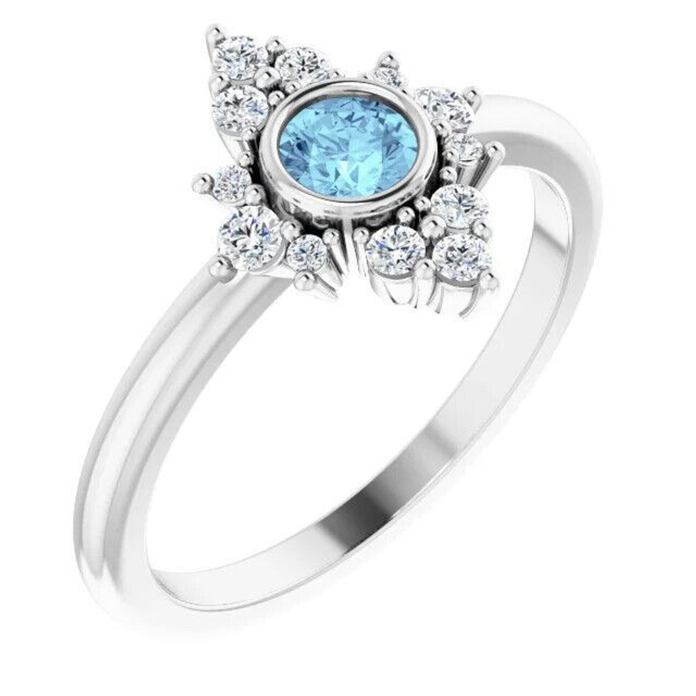 Elegant and vibrant, this round icy-blue aquamarine and diamond ring in platinum is a beautiful choice to top off all your favorite looks.