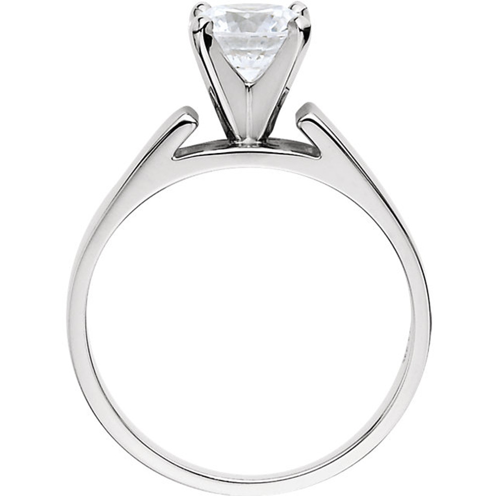 On the day you ask for her hand, wow her with a ring designed to take her breath away. Fashioned in sleek 14K white gold, this engagement ring features a 1/4 ct. round diamond that stands tall in a traditional four prong setting. 