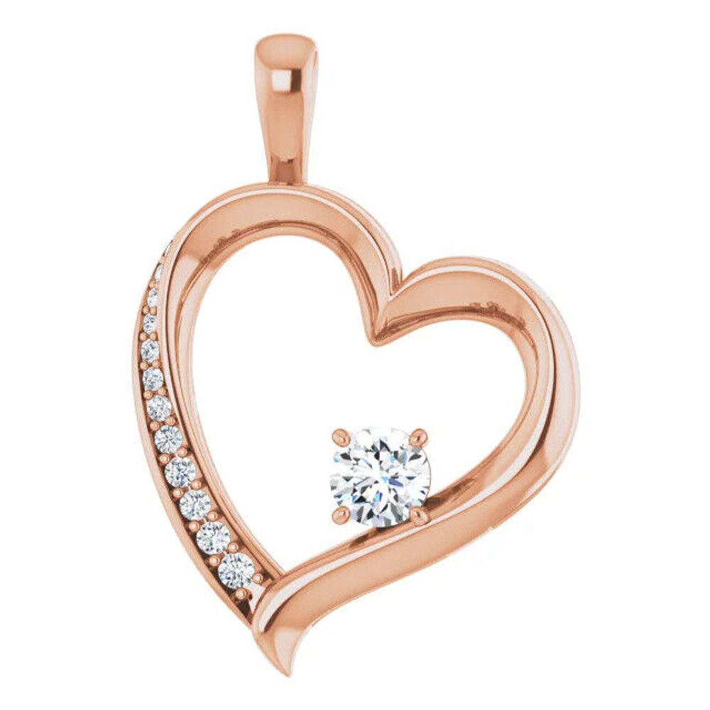 This stunning 14K Rose gold heart pendant features 1/3 CTW of natural diamonds, making it the perfect addition to any jewelry collection.