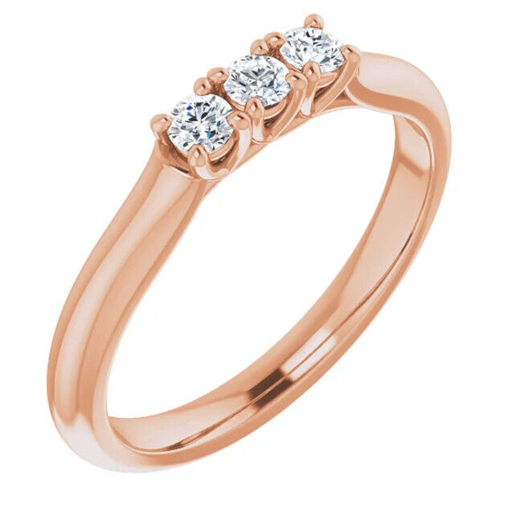 This exquisite 14K rose gold anniversary band features 1/5 CTW natural diamonds and is perfect for adding a touch of elegance to any outfit.