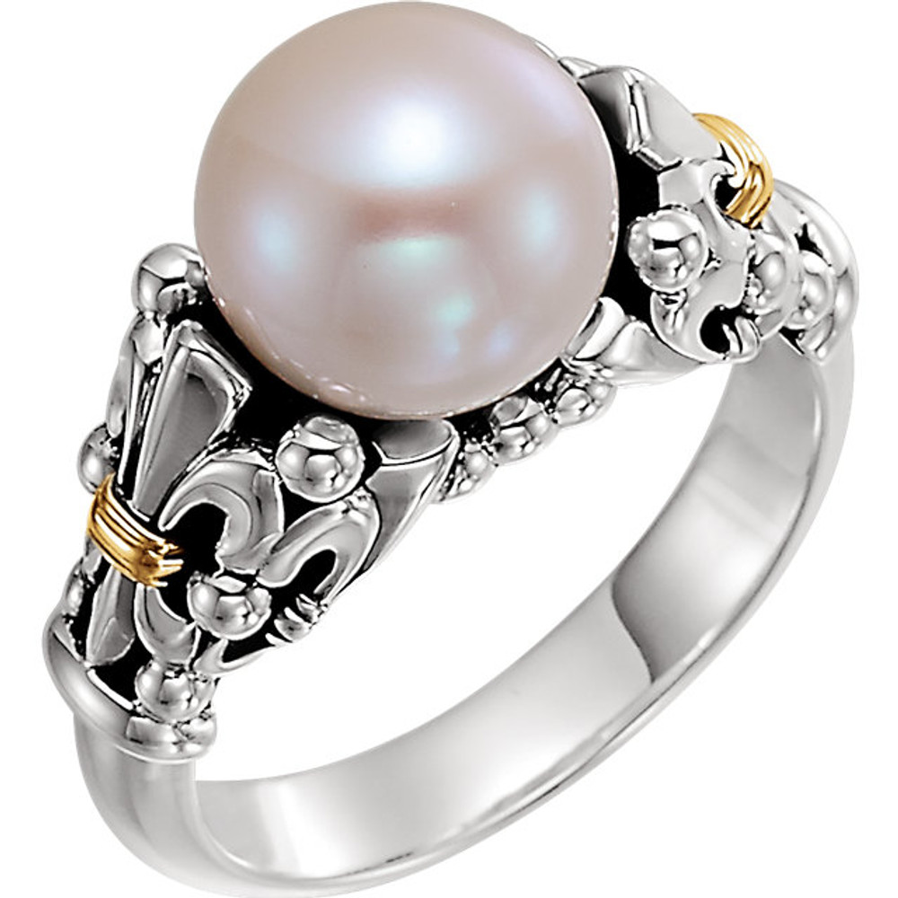 Crafted in sterling silver & 14k yellow gold, this freshwater pearl ring features gorgeous Fleur de Lis side accents.