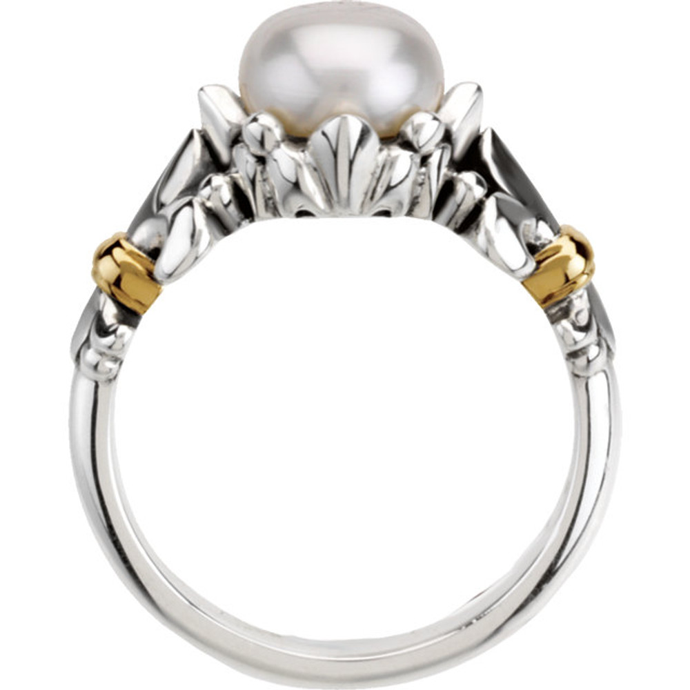 Crafted in sterling silver & 14k yellow gold, this ring features an 8-9mm round freshwater cultured pearl.