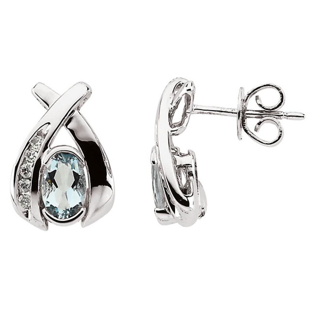Classic and sophisticated, these aquamarine earrings are a lovely look any time. Fashioned in 14K white gold, each earring features a 6x4mm oval aquamarine gemstone. Polished to a brilliant shine.