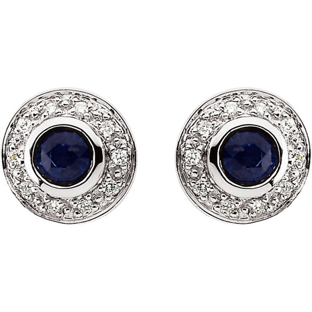 Fashionable and elegant, flaunt the ravishing beauty of these special earrings. Beautifully framed with 1/10 ct. t.w. of dazzling diamond accents, these earrings features two 3.50mm round gemstone sapphires that glisten beautifully. These luxurious 14K white gold posts secure comfortably with friction backs.