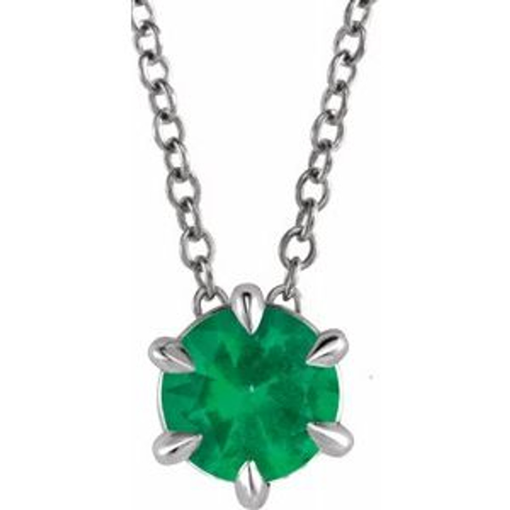 Crafted in platinum, this jewelry has a polished finish for eye-catching design. The necklace features a charming Emerald gemstone to complete the look.