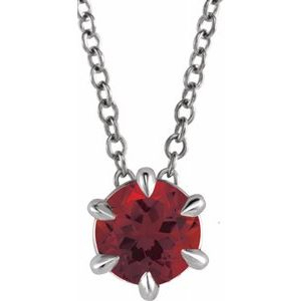 Crafted in platinum, this jewelry has a polished finish for eye-catching design. The necklace features a charming Mozambique Garnet gemstone to complete the look.