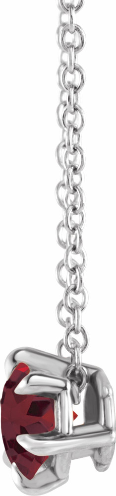 Crafted in sterling silver, this jewelry has a polished finish for eye-catching design. The necklace features a charming Garnet gemstone to complete the look.