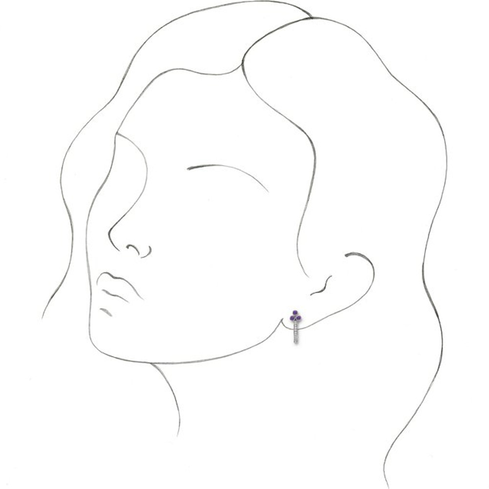 Add a splash of delightful color to your lobes with these platinum earrings adorned with sparking amethyst stones
