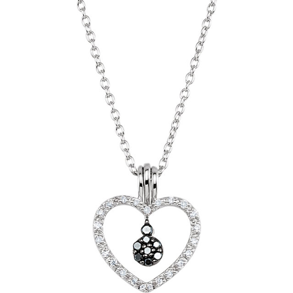 This romantic sterling silver necklace features a heart adorned with sparkling round diamonds. Diamond are 1/6ctw and H+ in color and I2 in clarity. Necklace is suspended from a sterling silver chain that is 18 inches in length.