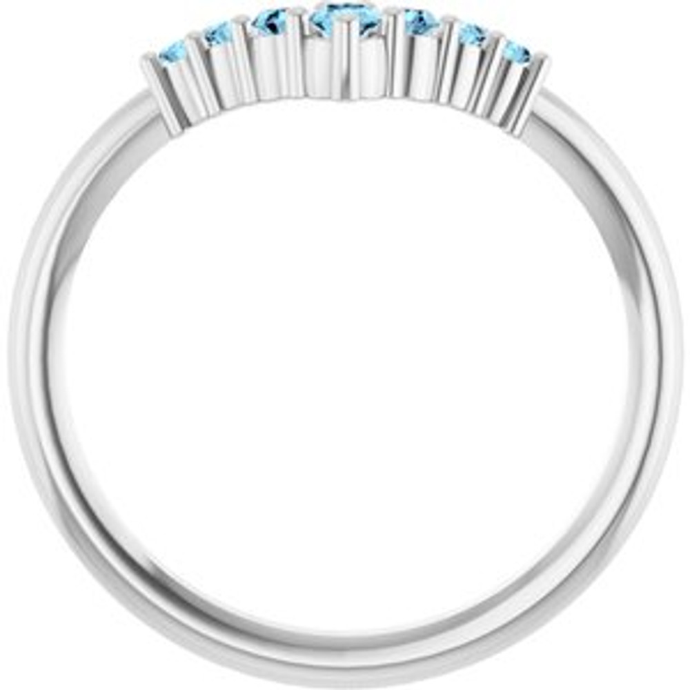 Dainty and feminine, this gemstone ring sets an elegant tone. The ring is set in platinum.
