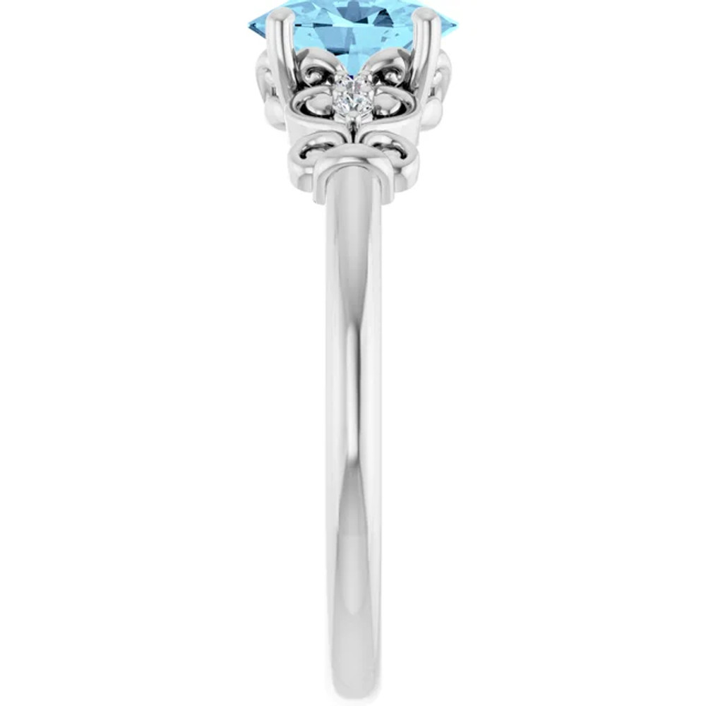 Dainty and feminine, this gemstone ring sets an elegant tone. The ring is set in platinum.