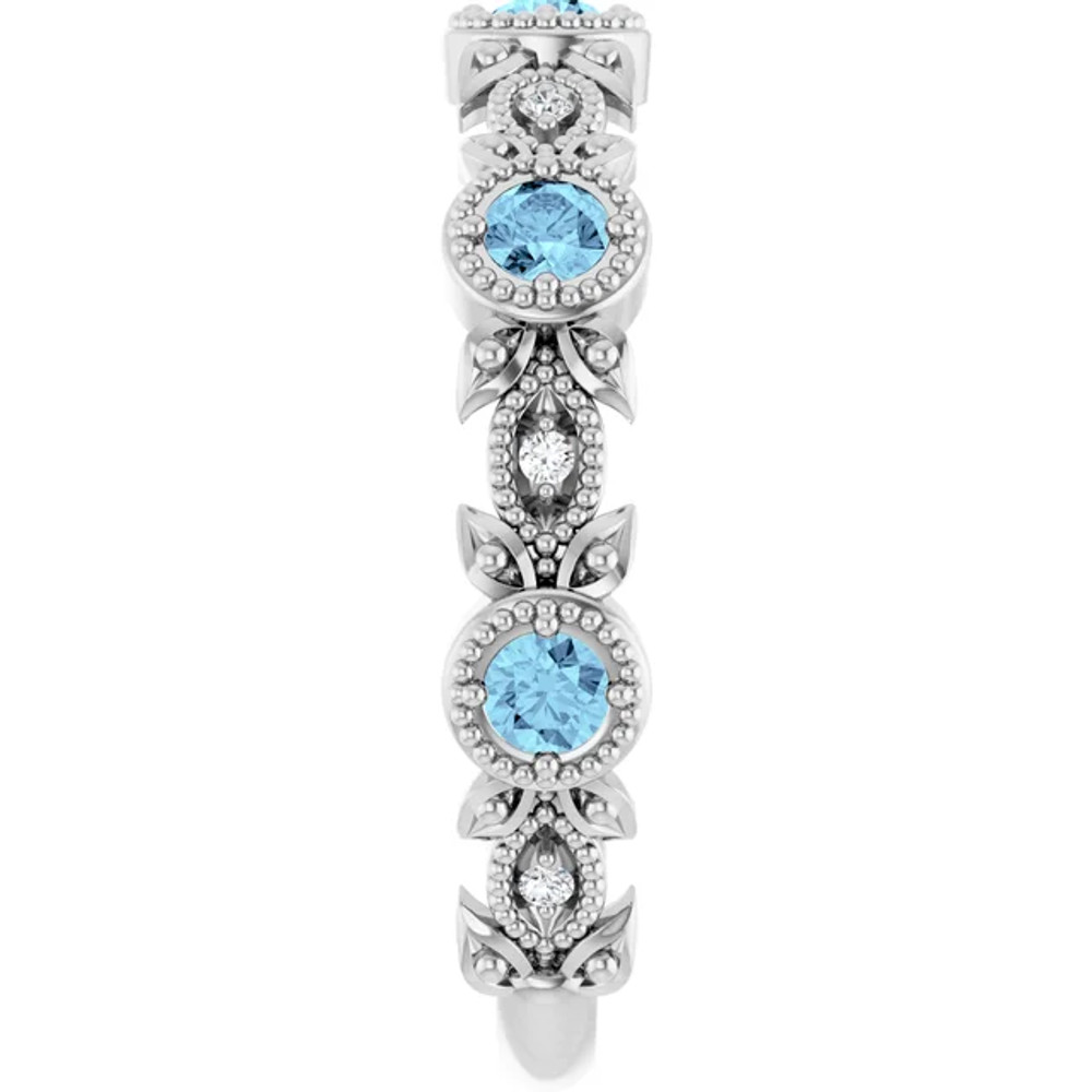 Dainty and feminine, this gemstone ring sets an elegant tone. The ring is set in platinum.