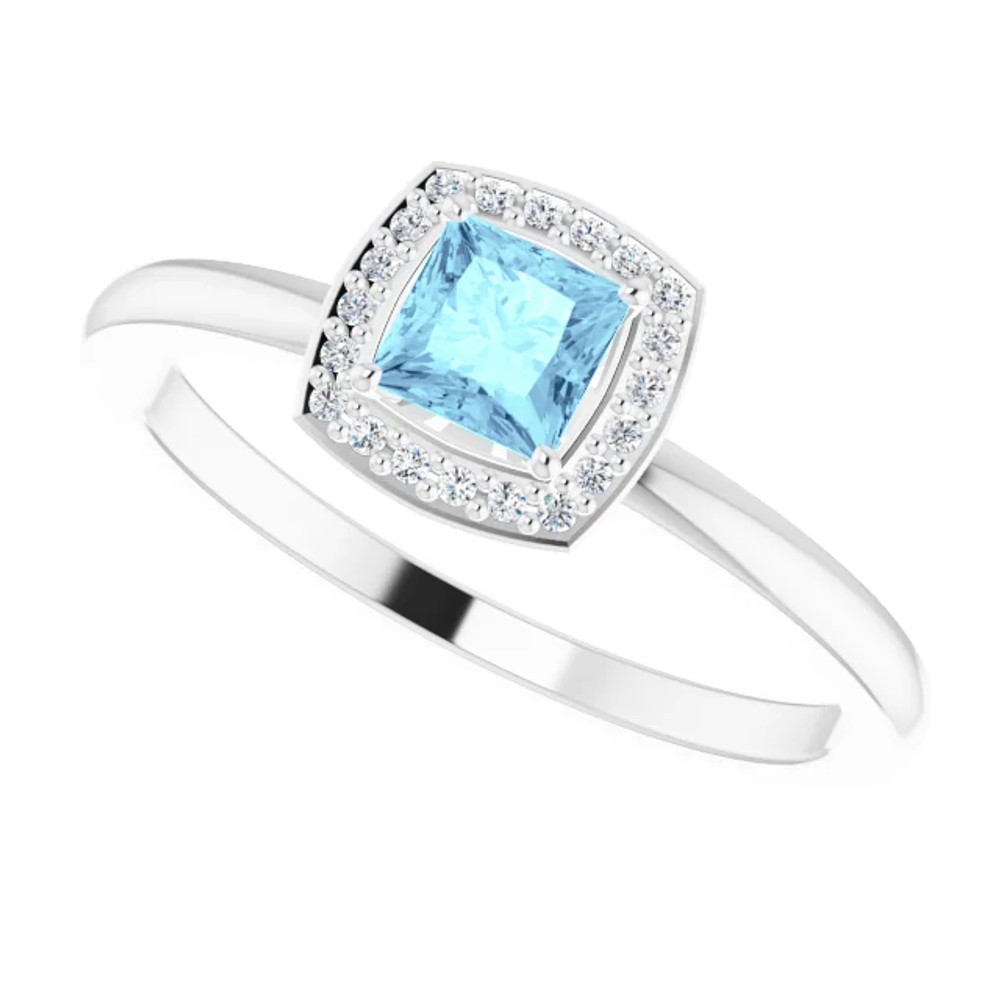 Dainty and feminine, this gemstone ring sets an elegant tone. The ring is set in platinum.