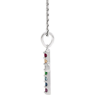 Inspiring and eye-catching, this sparkling Genuine Multi-Gemstone Cross pendant showcases beautiful sterling silver and matching 16-18" solid cable chain necklace.