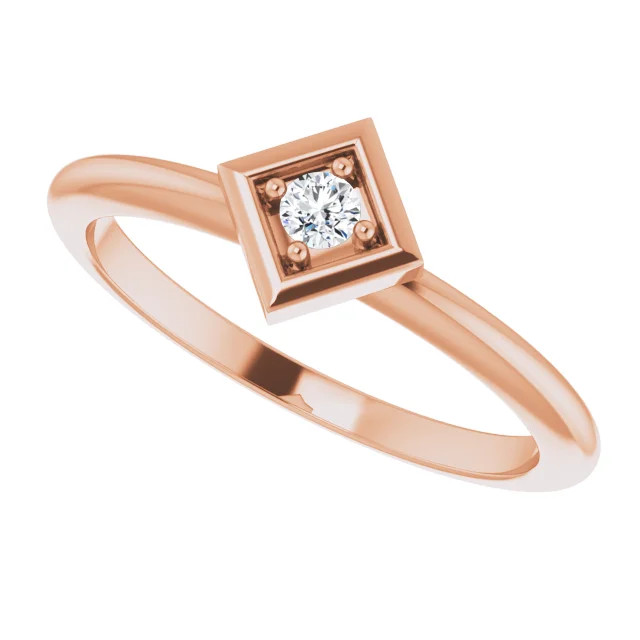 She'll be delighted to receive this charming diamond ring.