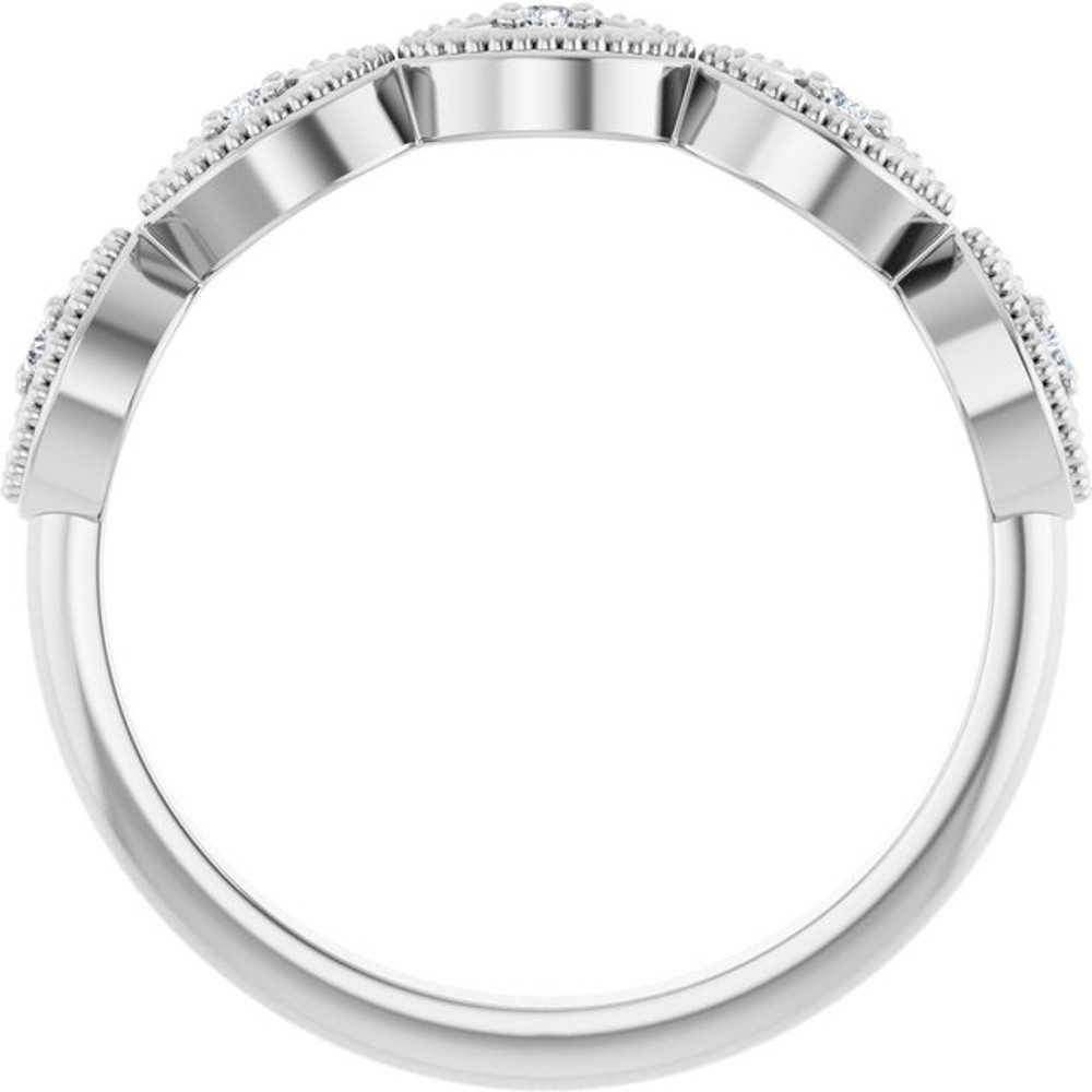 Faith meets fashion in this diamond cross ring.