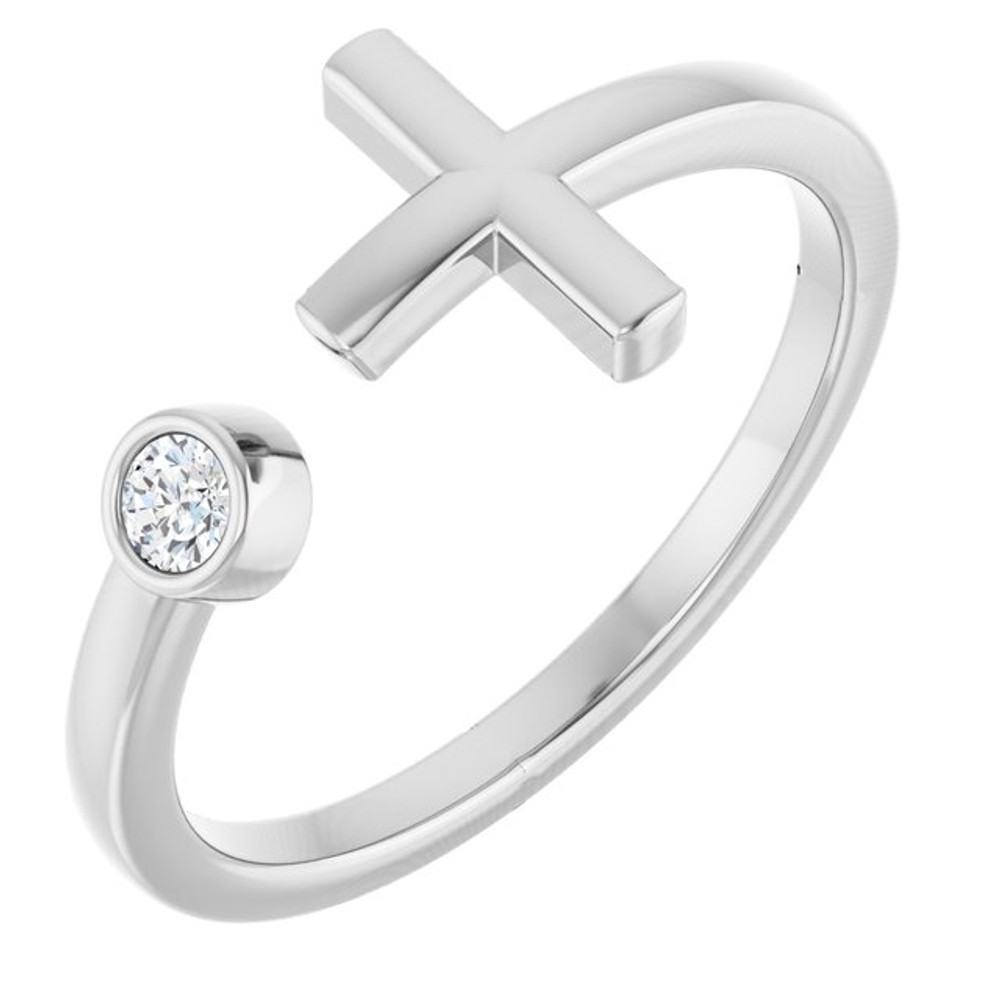 Faith meets fashion in this diamond cross ring.