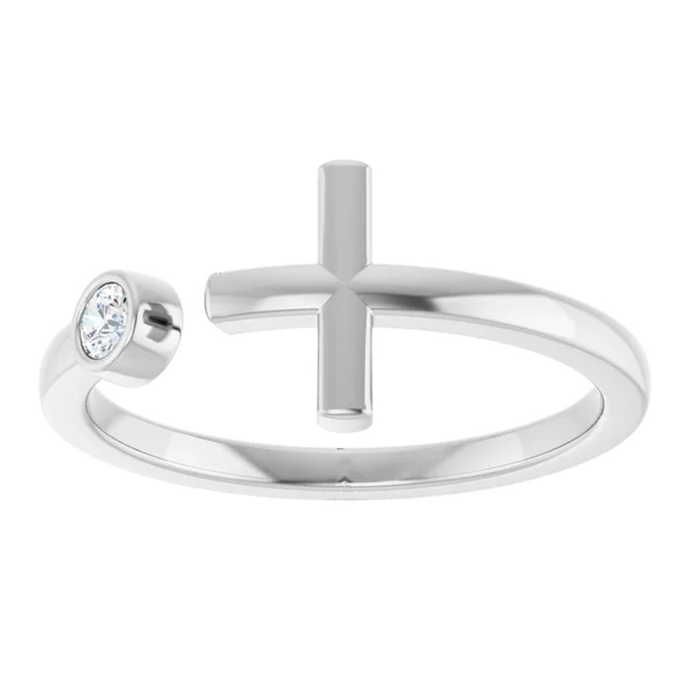 Faith meets fashion in this diamond cross ring.