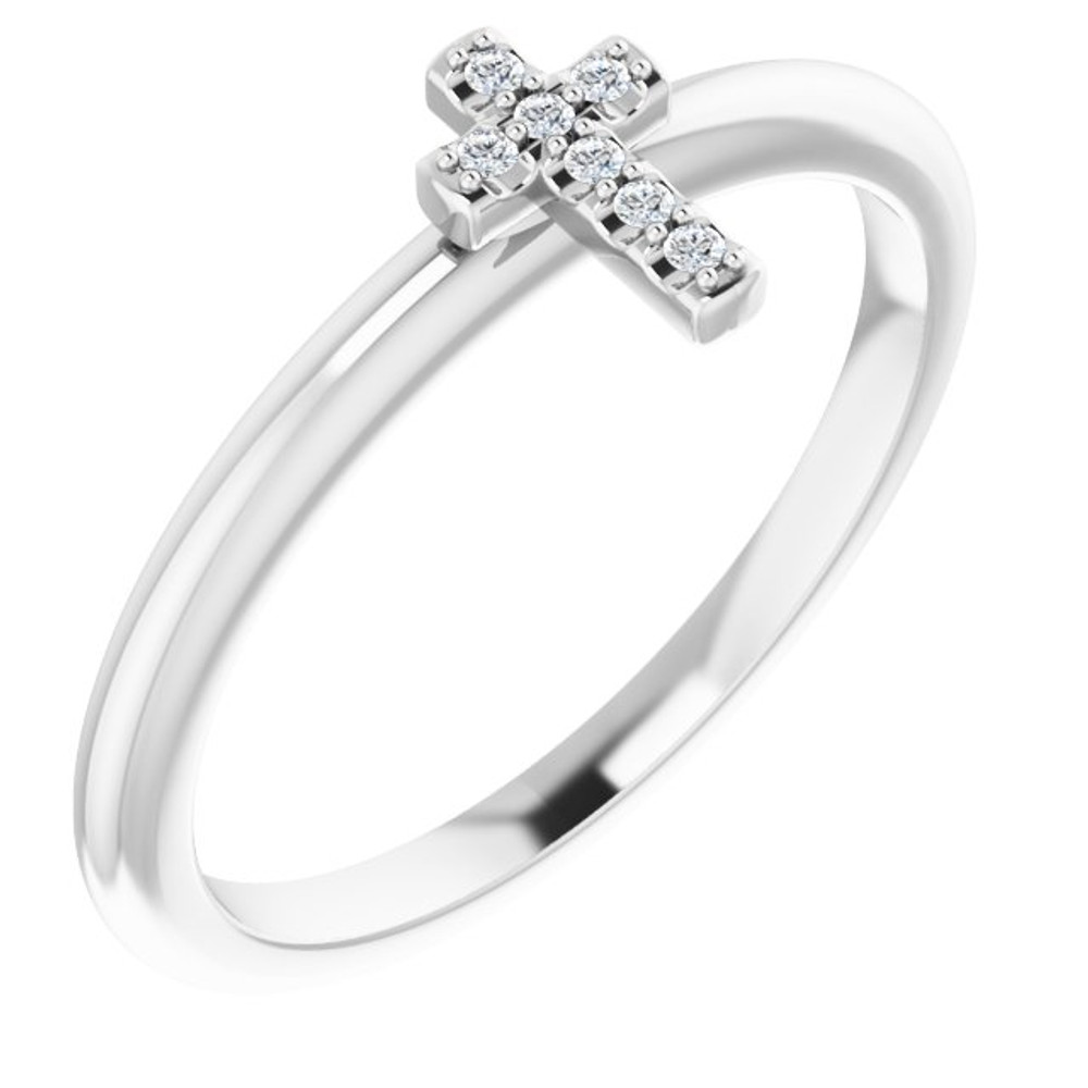 Faith meets fashion in this diamond cross ring.