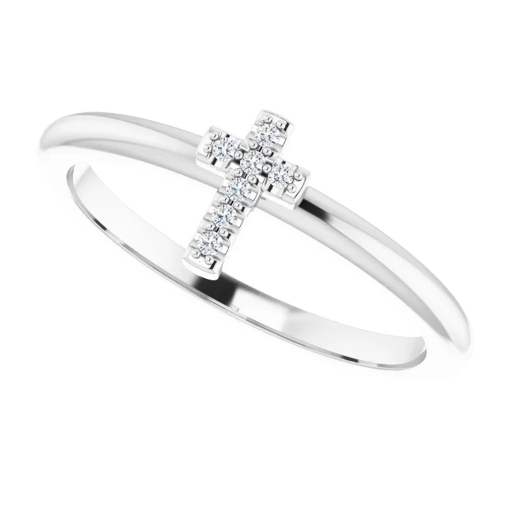 Faith meets fashion in this diamond cross ring.