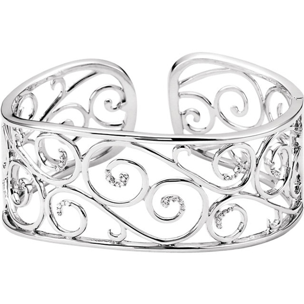 The openwork design of this sterling silver bracelet brings a fresh look to the classic cuff. Forty Six diamonds .25 ct. t.w. meet in the center of the elegant bracelet.