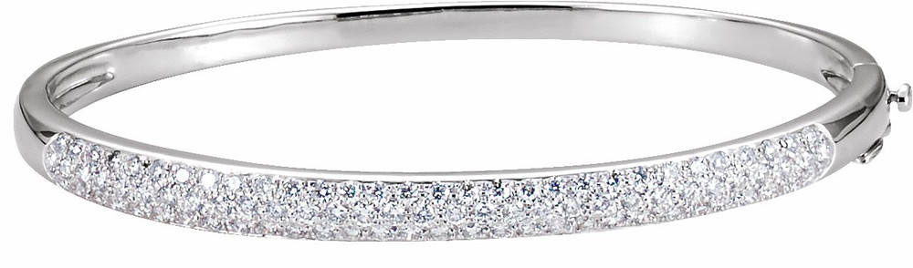 Simple, sleek and super stylish, this diamond bangle bracelet elevates any attire. Fashioned in 14K White Gold, this bracelet shimmers with a 1 1/2 ct. t.w. of shimmering white diamonds set in perfect alignment across the style. Buffed to a brilliant luster, this 7.0-inch circumference bangle bracelet secures with a box clasp.