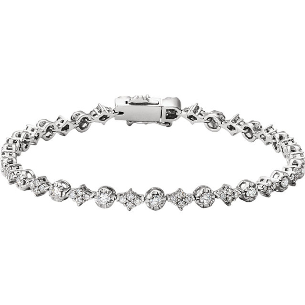 Brilliance defined, this diamond tennis 7.5" bracelet features brilliant cut round diamonds set in a prong setting in 14k white gold.