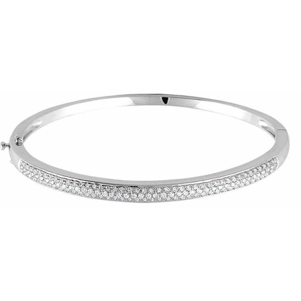 A classic look just for her, this diamond pave bracelet is certain to take her breath away. Fashioned in cool 14K white gold, this timeless design features an awe-inspiring 1 cts. t.w. of round diamonds, each with a color ranking of H+ and a clarity of I1. A sophisticated style, this 7.00-inch bracelet is polished to a brilliant shine.