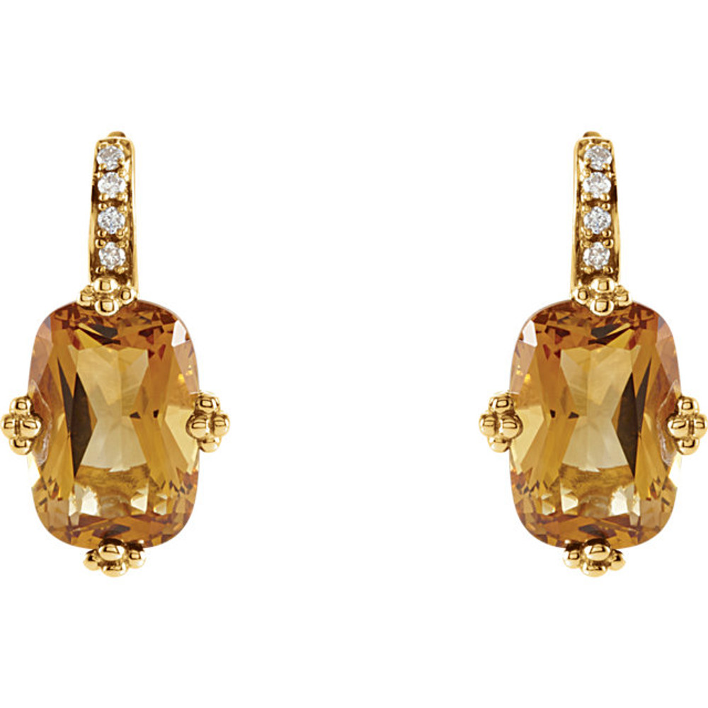 Elegant and dramatic, these captivating drop earrings are a statement look any woman would adore. Fashioned in 14K yellow gold, each earring showcases a 12.00x08.00mm citrine gemstones. The drop is adorned with shimmering diamond accents and polished to a fine shine, making this romantic gift the perfect birthday surprise.