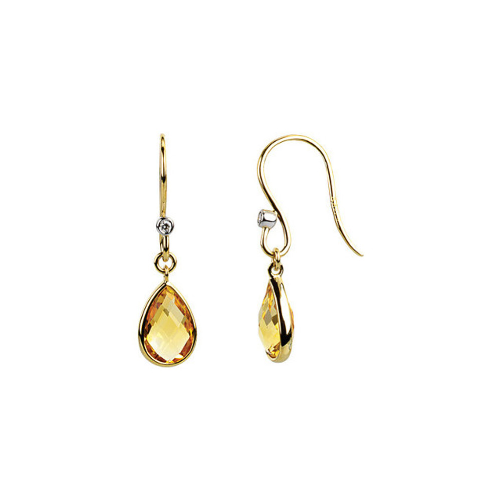 Elegant and dramatic, these captivating drop earrings are a statement look any woman would adore. Fashioned in 14K yellow gold, each  earring showcases a 09.00x06.00mm citrine gemstones. The drop is adorned with two shimmering diamond accents and polished to a fine shine, making this romantic gift the perfect birthday surprise.