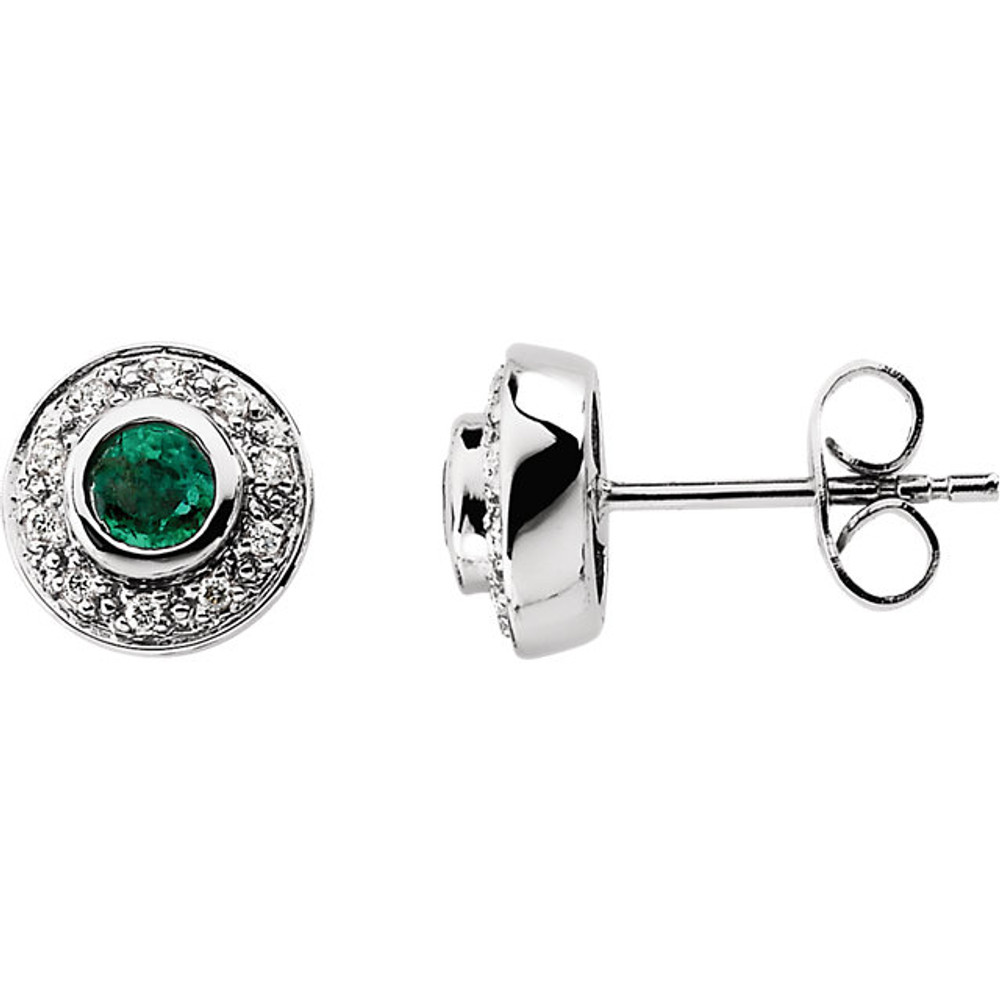 Fashionable and elegant, flaunt the ravishing beauty of these special earrings. Beautifully framed with 1/10 ct. t.w. of dazzling diamond accents, these earrings features two 3.50mm round gemstone emeralds that glisten beautifully. These luxurious 14K white gold posts secure comfortably with friction backs. A thoughtful gift for the May birthday girl.