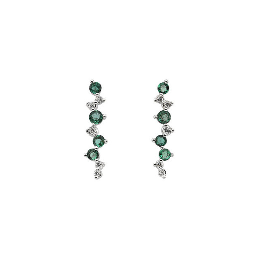 Elegant and dramatic, these captivating drop earrings are a statement look any woman would adore. Fashioned in 14K white gold, these earrings are 1/10 ct. tw. in an eye-catching linear drop.
