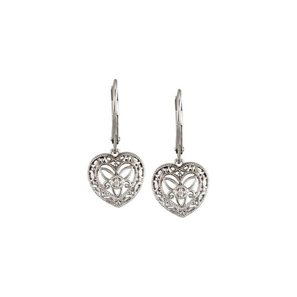 Celebrate a heart filled with love and a whole lot of sparkle with these stunning earrings. Beautifully crafted in sleek sterling silver, glistening with .02 ct. t.w. of diamonds, these drop earrings are polished to a radiant shine and comfortably secure with lever backs.