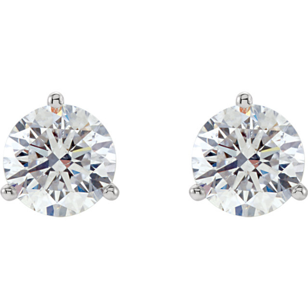 Truly brilliant, these diamond earrings are crafted in enduring three prong platinum settings with guardian backs and posts. Each earring weighs roughly 1 carat, for a total diamond weight of 2 carats.