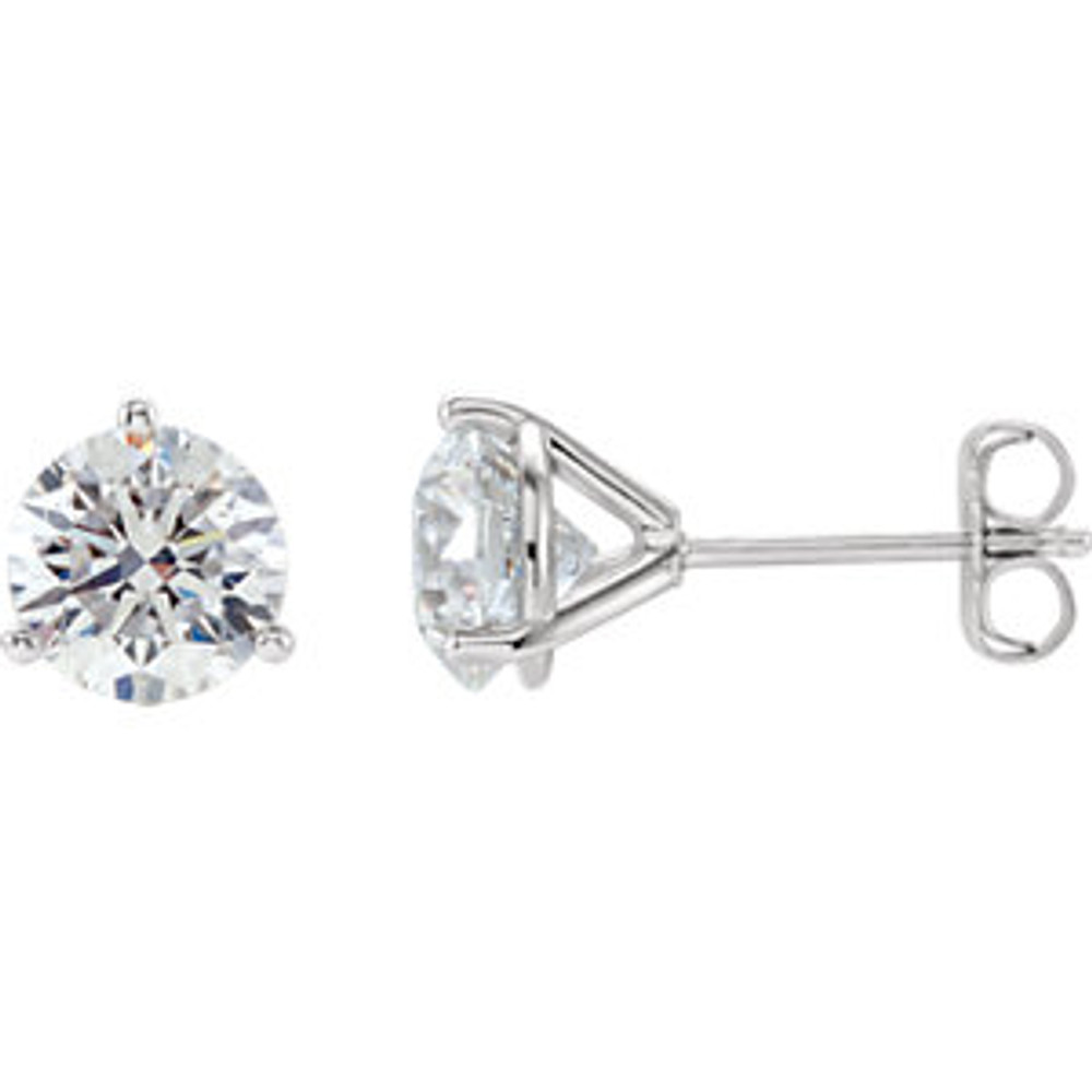 Truly brilliant, these diamond earrings are crafted in enduring three prong platinum settings with guardian backs and posts. Each earring weighs roughly 1 carat, for a total diamond weight of 2 carats.