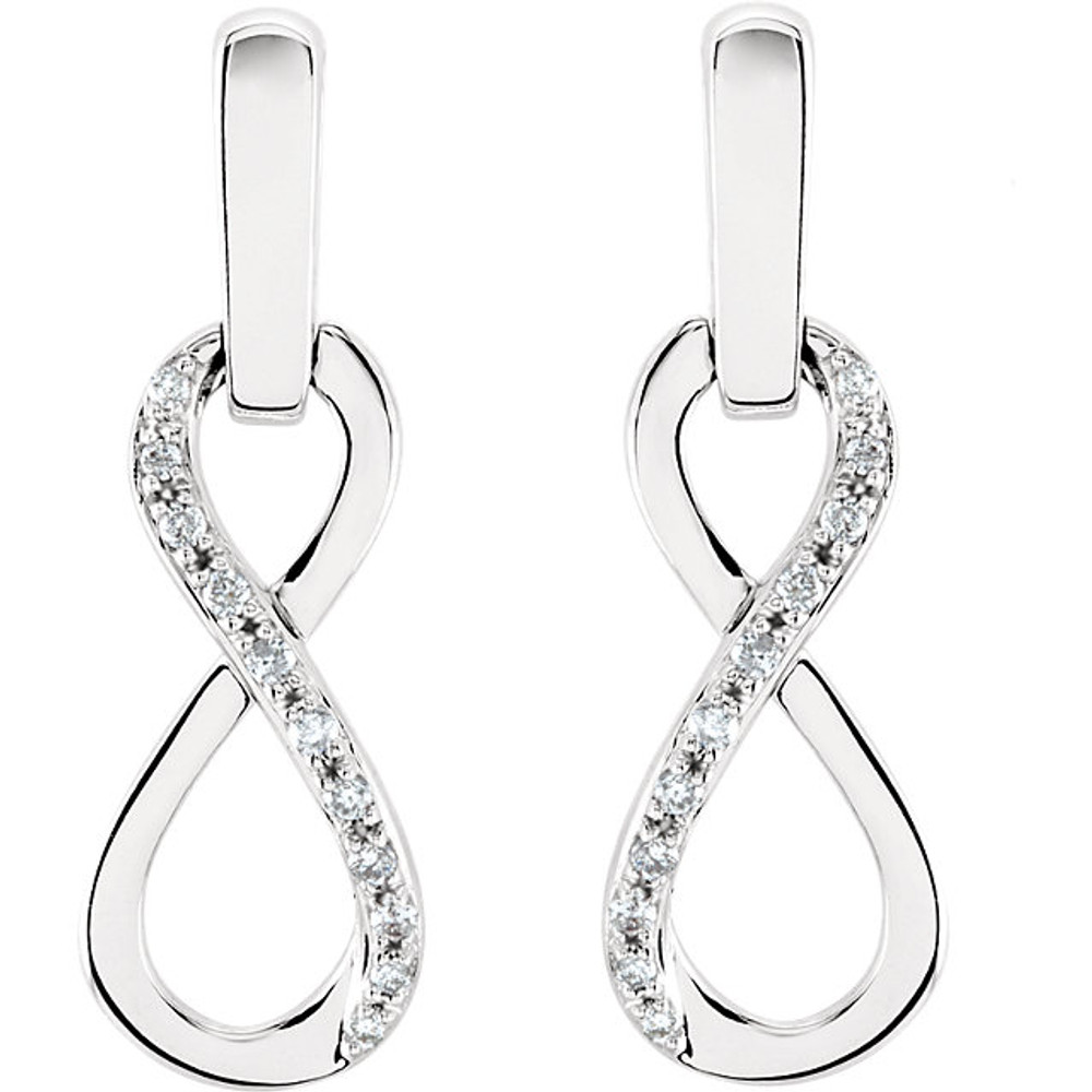 Don't just seek the limelight; go out there and take it the next time you attend a formal event. This pair of diamond drop earrings in white gold will enable you to do just that effortlessly. Trust us; this pair of earrings cannot be described as understated, humble or shy. The diamonds are all exemplary. Are you sure you can handle this much glamour?

    A design that will command attention effortlessly at any formal event.
    22 brilliant round cut diamonds.
    Built to last—the highest quality materials impeccably crafted.
    Ideal for stealing the limelight rather than seeking it.
    An incredible value for the lowest price.

This pair of 1/10 ct. tw. Diamond Drop Earrings in 14K White Gold features twenty-two round cut diamonds with a H+ color rating and I1 clarity.
