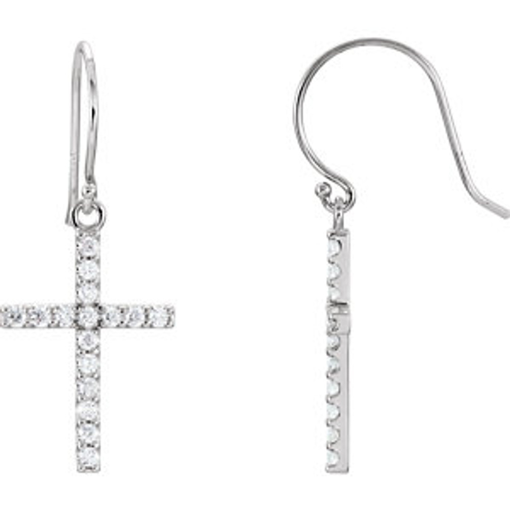 Celebrate faith. The sparkle of this cross pendant emits radiance through prong-set diamonds totaling 1/2 ct. tw. A traditional symbol set in 14K white gold.