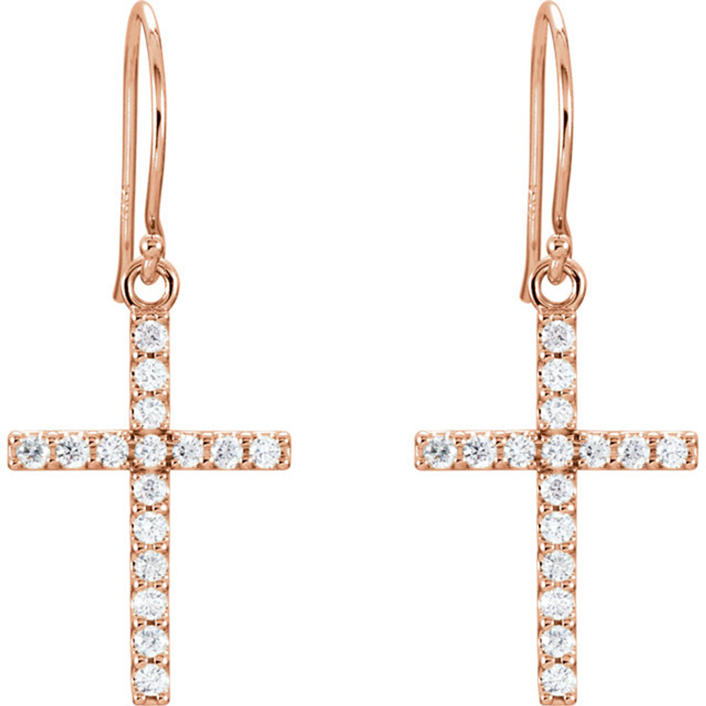 Celebrate faith. The sparkle of this cross pendant emits radiance through prong-set diamonds totaling 1/2 ct. tw. A traditional symbol set in 14K rose gold.