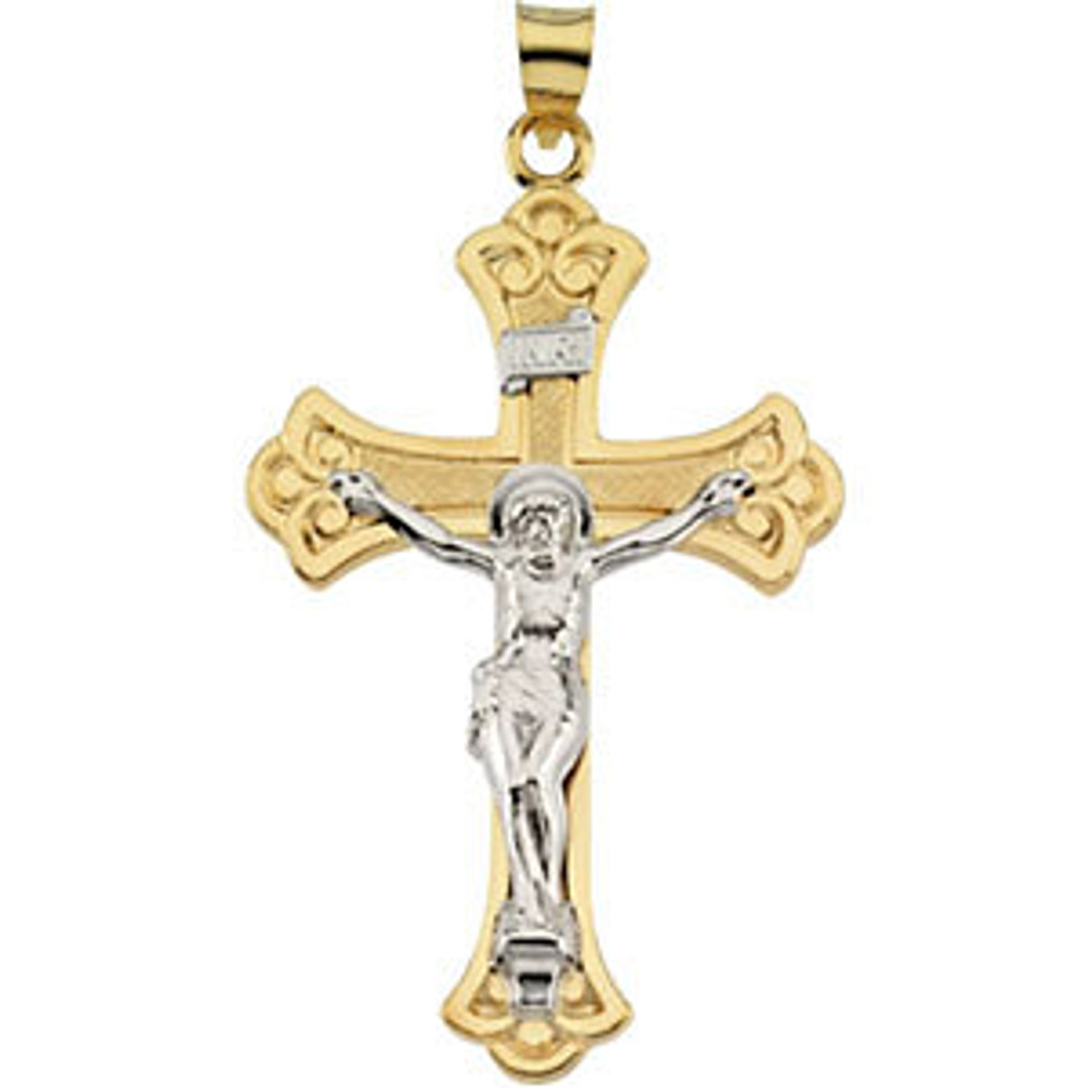 Designed to inspire, this petite crucifix pendant is crafted in 14k yellow gold and measures 45x31mm and has a bright polish to shine.