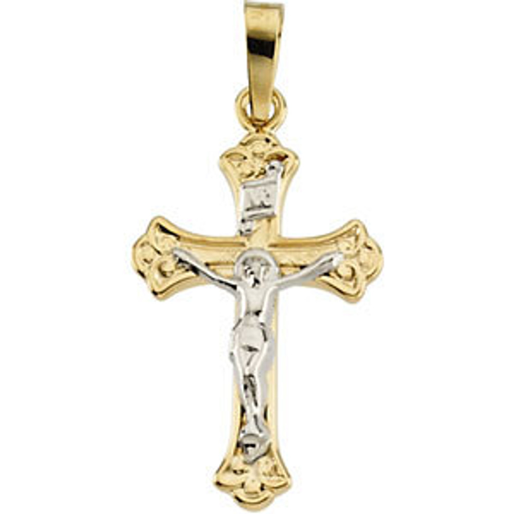 Designed to inspire, this petite cross pendant is crafted in 14k yellow gold and measures 19.00x13.00mm.