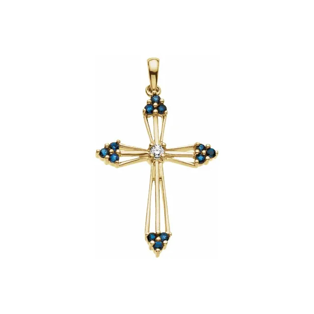 This stunning 14k yellow gold cross pendant features genuine blue sapphires and a diamond in the center. Diamonds are G-H in color, and SI1 in clarity. Polished to a brilliant shine.